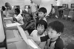 Asian American Boys, Atari Computer, Child at Keyboard, 1980s, TECPCD3306_143