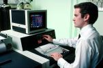 Man at Computer, Hand on Keyboard, 1980s, TECV02P13_02