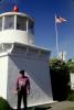 Tourist at the Trinidad Memorial Lighthouse, Humboldt County, California, West Coast, Pacific Ocean , TLHV08P03_10