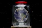 Earth Caught in a Jar, the inability for the earths thin atmosphere to cleanse human caused pollution, Photo-Illustration