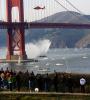 Golden Gate Bridge, fireboat spraying water, crowds