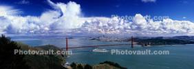Cruise Ship passes under the Golden Gate Bridge, clouds