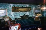 American Queen, Gentlemans Card Room, mounted fish, sofa, lamps, wallpaper