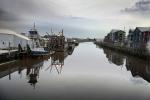 Petaluma River, calm, still, reflection, tugboat, pusher tug, buildings, TSWD01_294