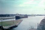 Canal, Freighter entering Soo Locks, Lake Superior to the lower Great Lakes, Sault Ste. Marie, Michigan, June 1976, 1970s, TSWV09P04_05