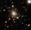 Peering Through the Lens of a Galaxy Cluster, UGND01_012