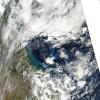 Sediment remained suspended in the waters off the Queensland coast of Australia in the wake of Tropical Cyclone Yasi. 