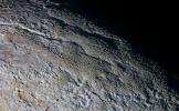 The Tartarus Dorsa Mountains Rise Up Along Pluto, snakeskin texture, UPTD01_015