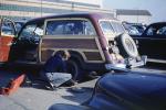 Man Changing the Tire, Woody, Ford, Tire Change, 1954, 1940s