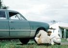 Changing a flat tire, Car, Vehicle, Automobile, Verracruz, Mexico, 1953, 1950s, VCOV01P01_16