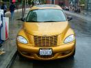 PT Cruiser, Second and King Streets, golden automobile, VCRD01_041