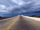 Mean Clouds, Road, Roadway, Pavement, Exterior, Outdoors, Outside, southwest of Houston, Texas, VCRD01_184