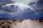 Rainbow over a dirt road, unpaved, VCRV09P12_04