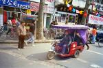 Three-wheeler, tri-wheeler, city street, driver, man, male, person, China, Minicar, Microcar, jitney, 1950s, VCRV11P09_01