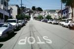 STOP, city street, hill, cars, steep, homes, houses, buildings
