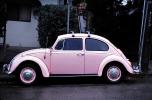Pink Volkswagen, compact car, automobile, vehicle, VCRV17P07_02