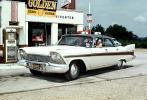 Golden Esso Extra, 1957 Plymouth Belvedere, Garage, Pumps, man, driver, person, automobile, Tail Fins, four-door sedan, car, 1950s, VCRV18P13_04