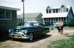 Oldsmobile, Parked Car, Driveway, Convertible, Home, house, building, man, Long Island New York, 1950s, VCRV20P11_11