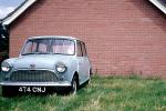 Mini Cooper, tiny car, small, driver, automobile, September 1964, 1960s, VCRV21P02_13