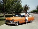 Orange Cadillac, woman, car, Dagmar Bumps, 1950s, VCRV21P14_03