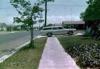 Chevy Impala Station Wagon, sidewalk, lawn, suburban, suburbia, June 1966, 1960s