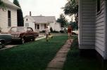 Chevy parked, driveway, homes, houses, suburban, 1960s, VCRV22P06_07
