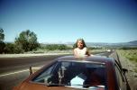 Girl Pops her Head through the Sun Roof, Highway, road, September 1979, 1970s, VCRV23P05_07