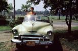 Woman with her 1951 Chevrolet Deluxe Car, Cabriolet, 1950s, VCRV23P13_06