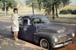 Woman with her 1963 Volvo PV544, 1960s, VCRV24P05_10