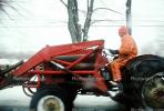 Tractor Plowing Snow