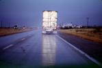 rain, wet, slippery, inclement weather, near Alamogordo, Highway-70, Semi-trailer truck, Semi, VCTV03P09_14