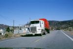 Kenworth, north of Espanola, Highway-68, flatbed trailer