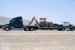 backhoe tractor, pickup truck, flatbed trailer, Semi-trailer truck, Semi