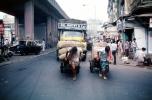 Jal Mistry, Men pulling carts, on the Streets of Mumbai