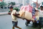 Men, Pulling a laundry Cart, pushing, on the Streets of Mumbai, VCVV01P01_17