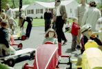 Smiling Girl in her Downhill Racer, Soap Box Derby, suburbia, 1950s