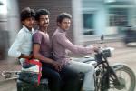 Three men on a motorcycle, riding, ride, smiles