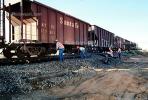 Gravel Hopper railcar, Train accident near Kingman, Arizona, caused by flash flooding, daytime, daylight