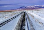 Railroad Tracks in the Snow, Brush, Shrub, Ice, Cold, Cool, Frozen, Icy, Winter, hills, mountains, VRFV03P02_18