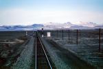 Signal Light, Railroad Tracks in the Snow, Brush, Shrub, Ice, Cold, Cool, Frozen, Icy, Winter, hills, mountains, VRFV03P03_13