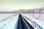 Railroad Tracks in the Snow, Brush, Shrub, Ice, Cold, Cool, Frozen, Icy, Winter, hills, mountains, VRFV03P04_13
