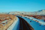 Railroad Tracks in the Snow, Brush, Shrub, Ice, Cold, Cool, Frozen, Icy, Winter, hills, mountains, VRFV03P05_12.3290