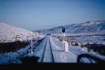 Signal Light, Railroad Tracks in the Snow, Brush, Shrub, Ice, Cold, Cool, Frozen, Icy, Winter, hills, mountains, VRFV03P06_18.0586