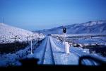 Signal Light, Railroad Tracks in the Snow, Brush, Shrub, Ice, Cold, Cool, Frozen, Icy, Winter, hills, mountains, VRFV03P06_18