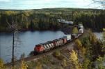 CN 9438, piggyback train, containers, forest, woodlands, lake, September 1994