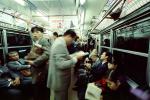Crowded Train, passengers going home, suits, men, women, interior, inside, VRHV01P14_18