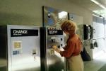 Passenger purchasing a ticket, Bay Area Rapid Transit, BART, Ticket Machine, commuters, 1980s