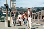 man with suit and tie, Passengers leaving a BART Train, commuters, 1980s