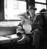 Man Reading Newspaper, Daily Commuter, 1940s