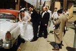 Wedding Couple enters Car, 1950s, WEDV01P05_09